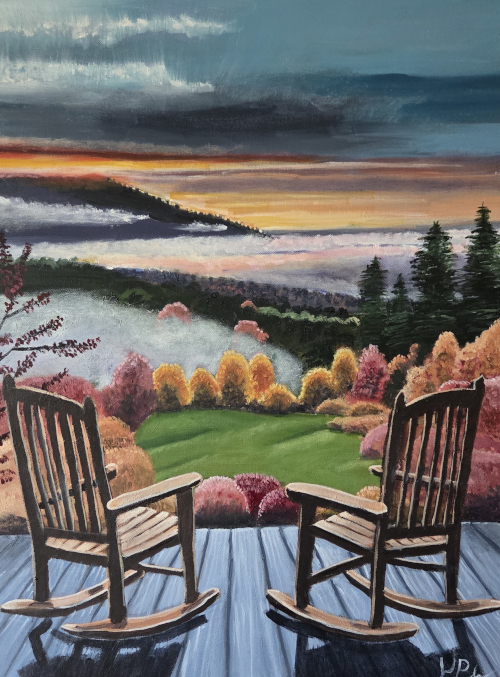 Rocking chairs before landscape